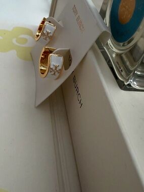 Tory Burch Gold and White Enamel Logo Huggie Earrings